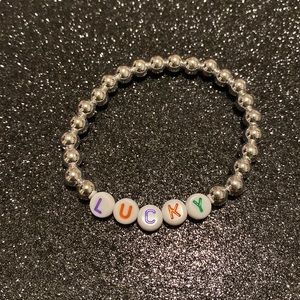 Kids faux silver beaded stretch lucky bracelet
